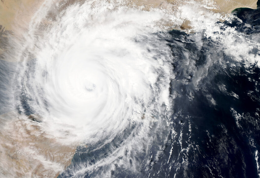 a satellite image of a hurricane in the middle of the ocean - Hurricane Insurance Claim