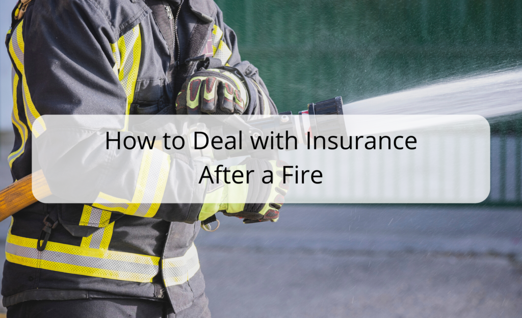 a firefighter spraying water on a fire hydrant - Fire Damage Insurance Claim Adjuster